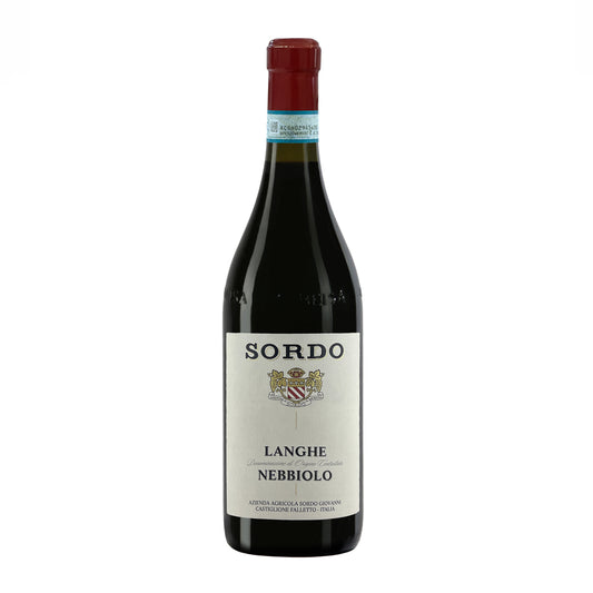 Bottle of Sordo Langhe Nebbiolo wine with a red label and the brand's coat of arms on the label.