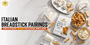 Tita Italia blog banner titled Italian Breadstick Pairings: 5 Ways to Serve I Bibanesi with Cheese, Wine and More on marble.