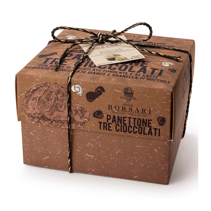 A square brown cardboard box of Borsari Panettone Tre Cioccolati, tied with a twine bow and featuring a small paper tag, photographed on a white background.