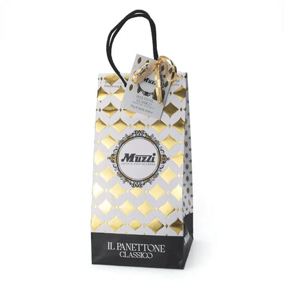 Packaged panettone cake in an elegant shopper bag with 'MUZZI' branding and 'Il PaneRamo Classico' written on the front, indicating it is a traditional Italian festive cake.