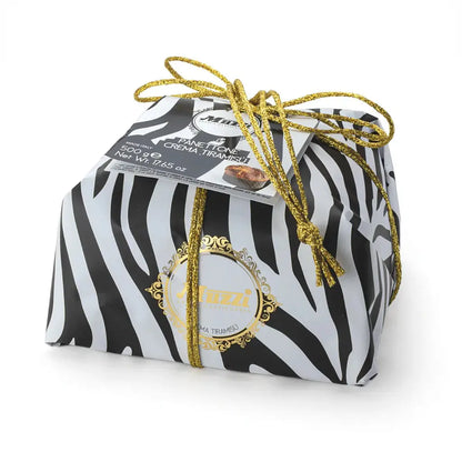 A Panettone cake with Tiramisó cream and coffee chocolate drops, wrapped in an original zebra-print packaging with a gold bow.
