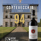 A wine bottle labeled Chianti Classico Riserva Cortevecchia 2022 shown in front of a large estate building, with large overlaid text reading 94 PTS and a JSO Wine Ratings logo. This is not a clean standalone product shot because the scene and text graphics dominate the presentation, so I classify it as Other rather than Product/Packaging or Lifestyle.