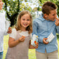 some kids enjoying with bibanesi breadsticks