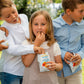 some kids enjoying with bibanesi breadsticks