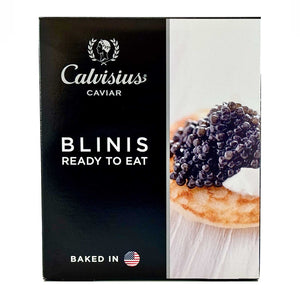 Calvisius Caviar blinis packaging with caviar on a blini.