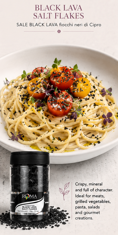 pasta plated with tomatos and black lava salt flakes