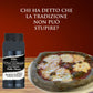 Black food product bottle next to black pizza on a wooden surface with Italian text on a red background