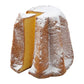 Italian pandoro dusted with powdered sugar on a white background