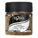 Jar of Roma smoked salt flakes on a white background