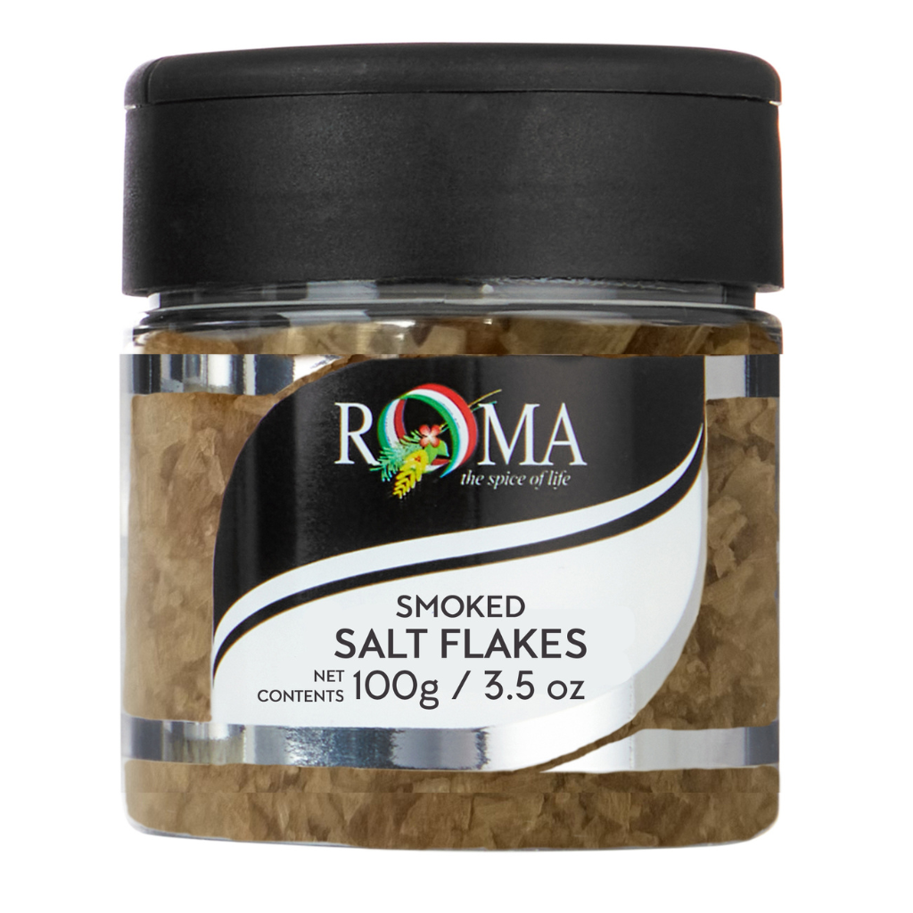 Jar of Roma smoked salt flakes on a white background
