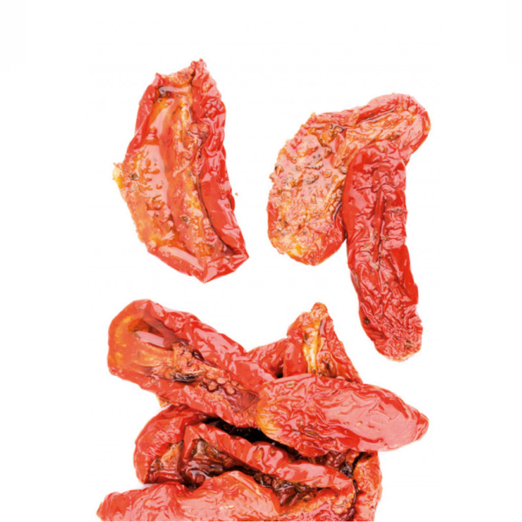 semidried tomatos on a white background